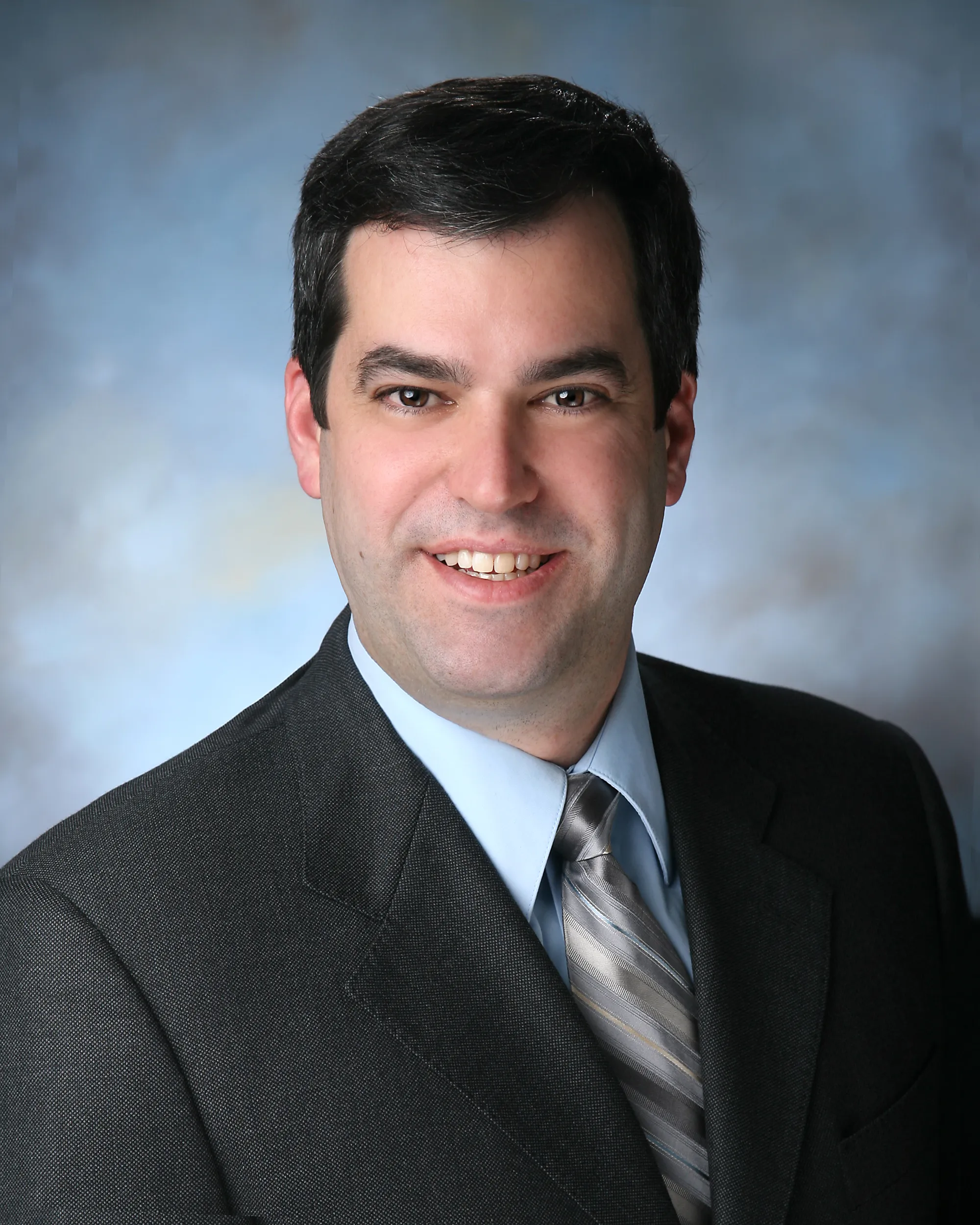 岳漢（John Scatoloni），商業地產經紀人